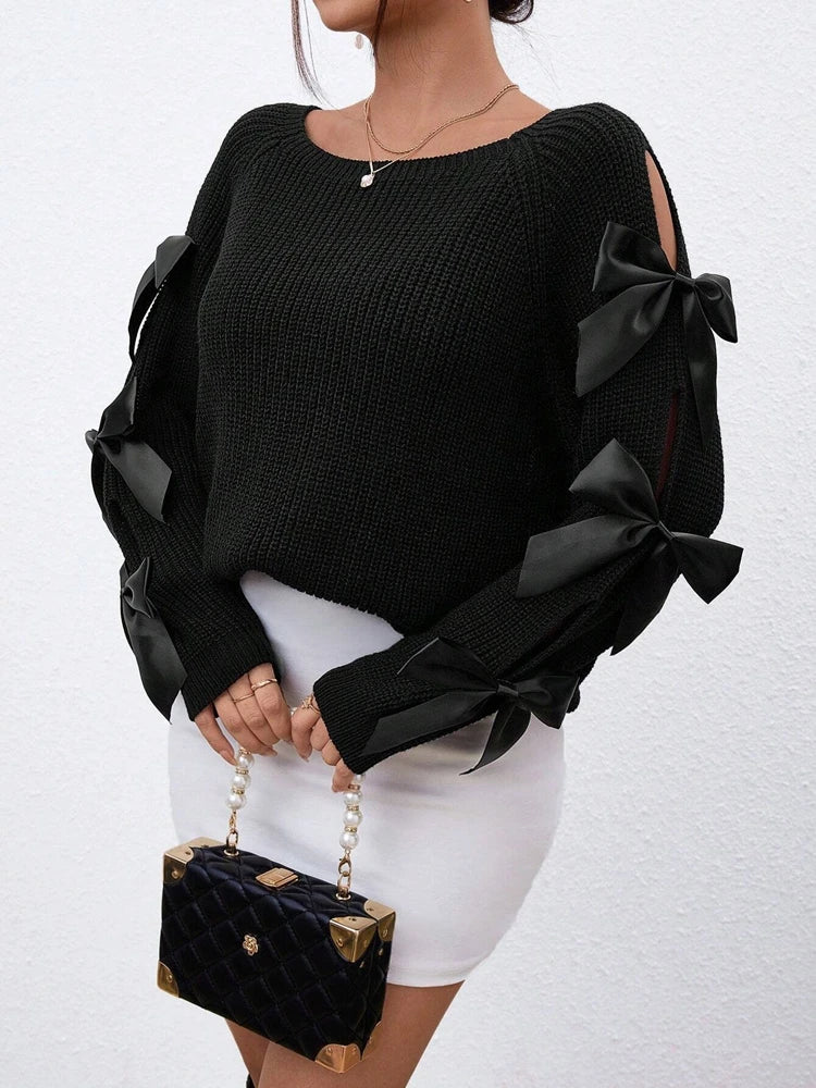 Fashionable bow details hollowed out raglan sleeves knit sweater round neck minimalist sweater