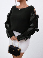Fashionable bow details hollowed out raglan sleeves knit sweater round neck minimalist sweater