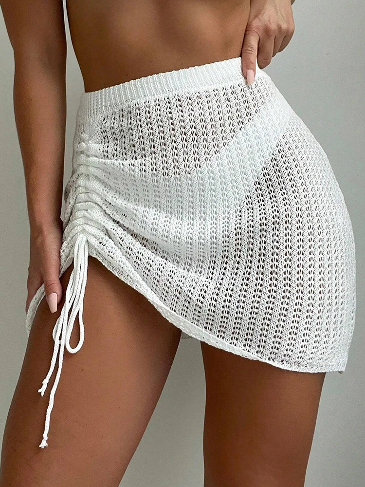 Fashionable and elegant short skirt pool party with hollowed out drawstring bikini knit short skirt summer beach
